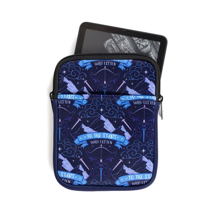 E-reader sized book sleeve with pattern of Mt. Ramiel with swords on each side from ACOTAR and underneath reads ‘To the star who listen.’
