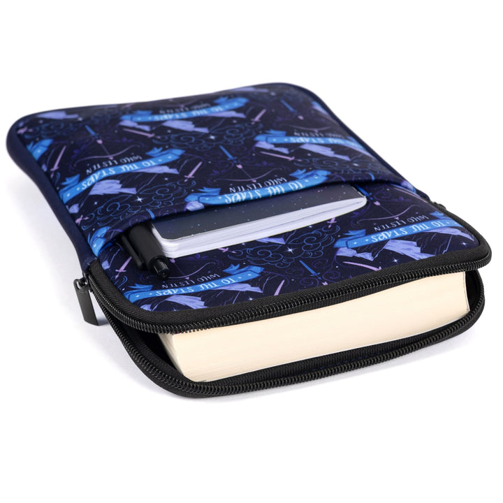 Inside view of book sleeve with pattern of Mt. Ramiel with swords on each side from ACOTAR and underneath reads ‘To the star who listen.’