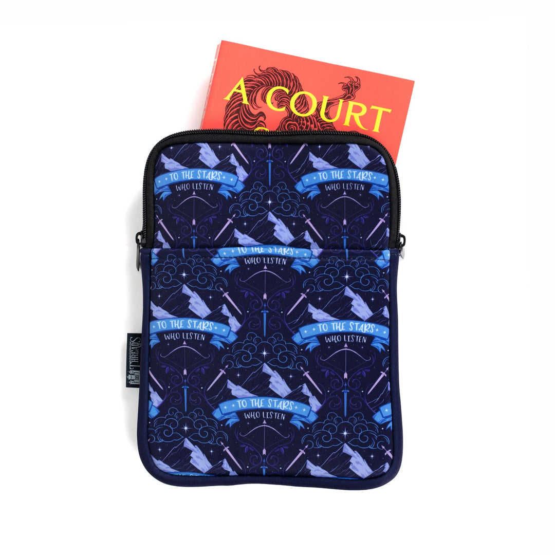 Medium sized book sleeve with pattern of Mt. Ramiel with swords on each side from ACOTAR and underneath reads ‘To the star who listen.’