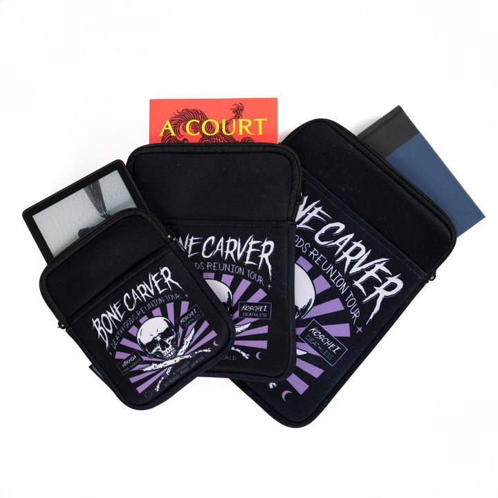 3 book sleeve sizes fanned out, small, medium, and large, with an illustration that reads ‘Bonecarver Death Gods Reunion Tour, Stryga the Weaver, Koschei Deathless, a power beyond this world.’