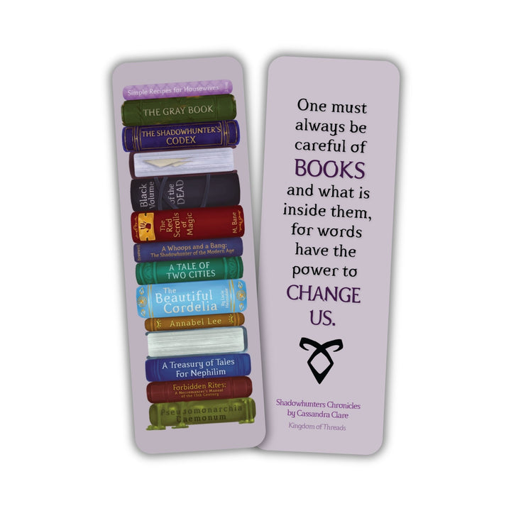  Double sided purple bookmark. One side is stack of books from the Shadowhunters world. Other side reads ‘One must always be careful of books and what is inside them, for words have the power to change us.’
