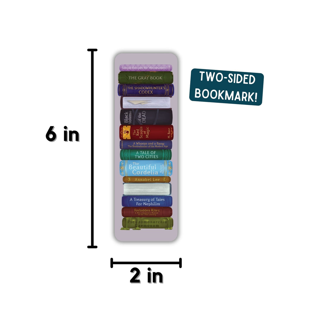  One side is stack of books from the Shadowhunters world. Other side reads ‘One must always be careful of books and what is inside them, for words have the power to change us.’ With 
measurements 6 in by 2 in.