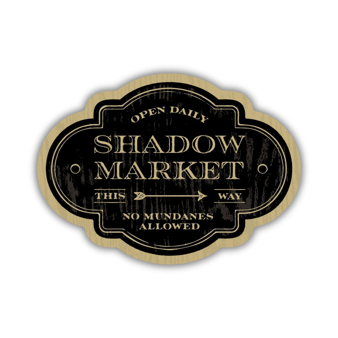 Sticker looks like an antique sign and reads ‘Open daily. Shadow Market, this way. No mundanes allowed.’