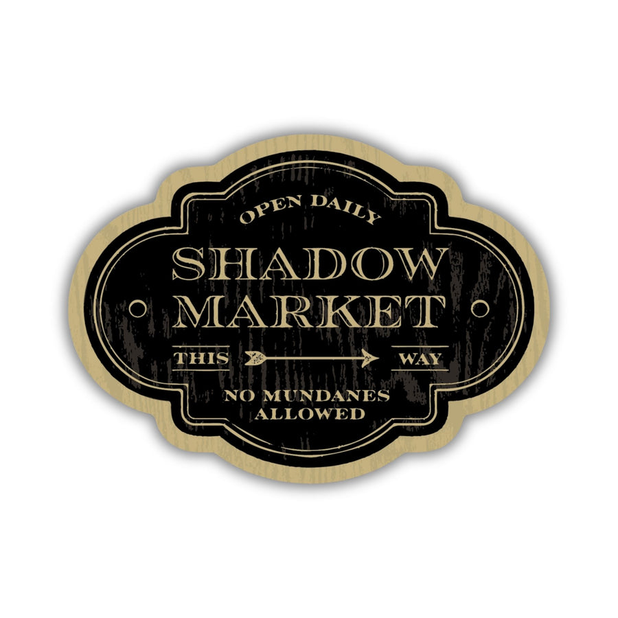 Sticker looks like an antique sign and reads ‘Open daily. Shadow Market, this way. No mundanes allowed.’