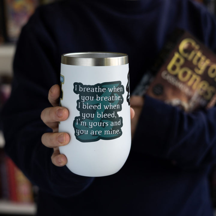  Shadowhunters quote sticker reads: ‘I breathe when you breathe, I bleed when you bleed, I’m yours and you are mine,’ with parabatai rune, on a white tumbler.