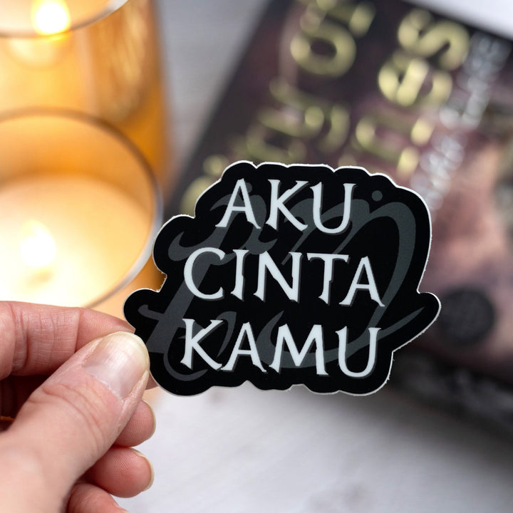  Shadowhunters quote sticker reads: ‘Aku cinta kamu’ with the bind to rune, held over City of Bones.