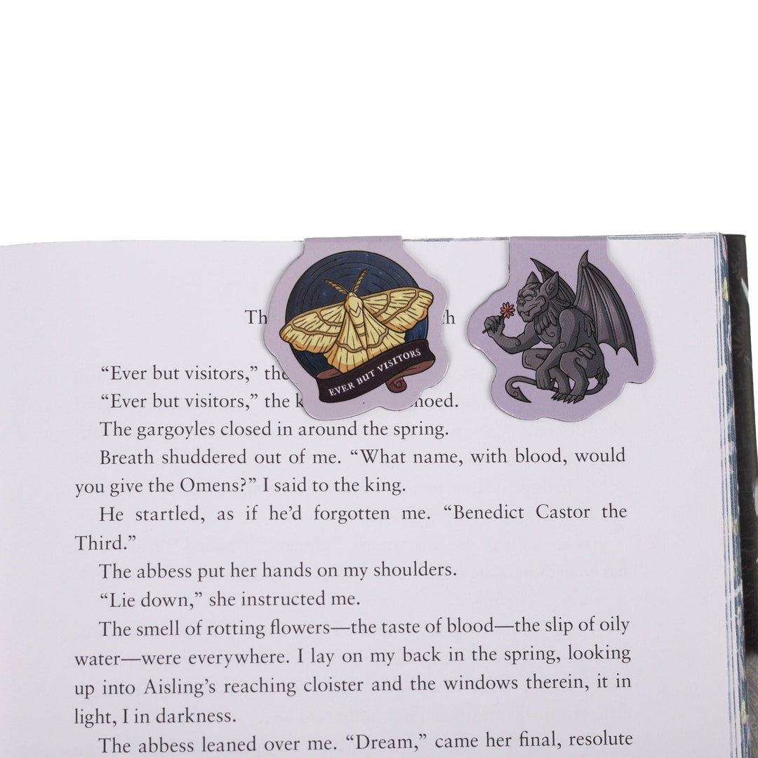 Moth with ‘Ever But Visitors’ & Bartholomew with a rose magnetic bookmarks on open book. From Knight and the Moth.