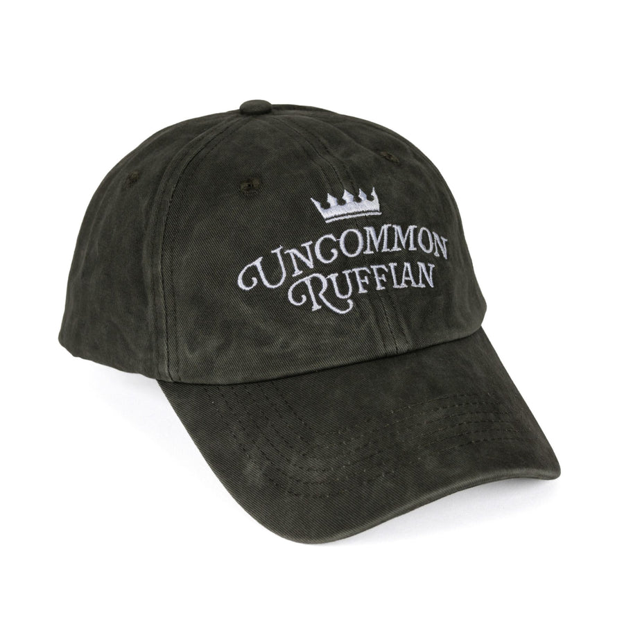 Dark brownish grey hat with the quote ‘Uncommon Ruffian’ from Holly Black’s Folk of Air series.
