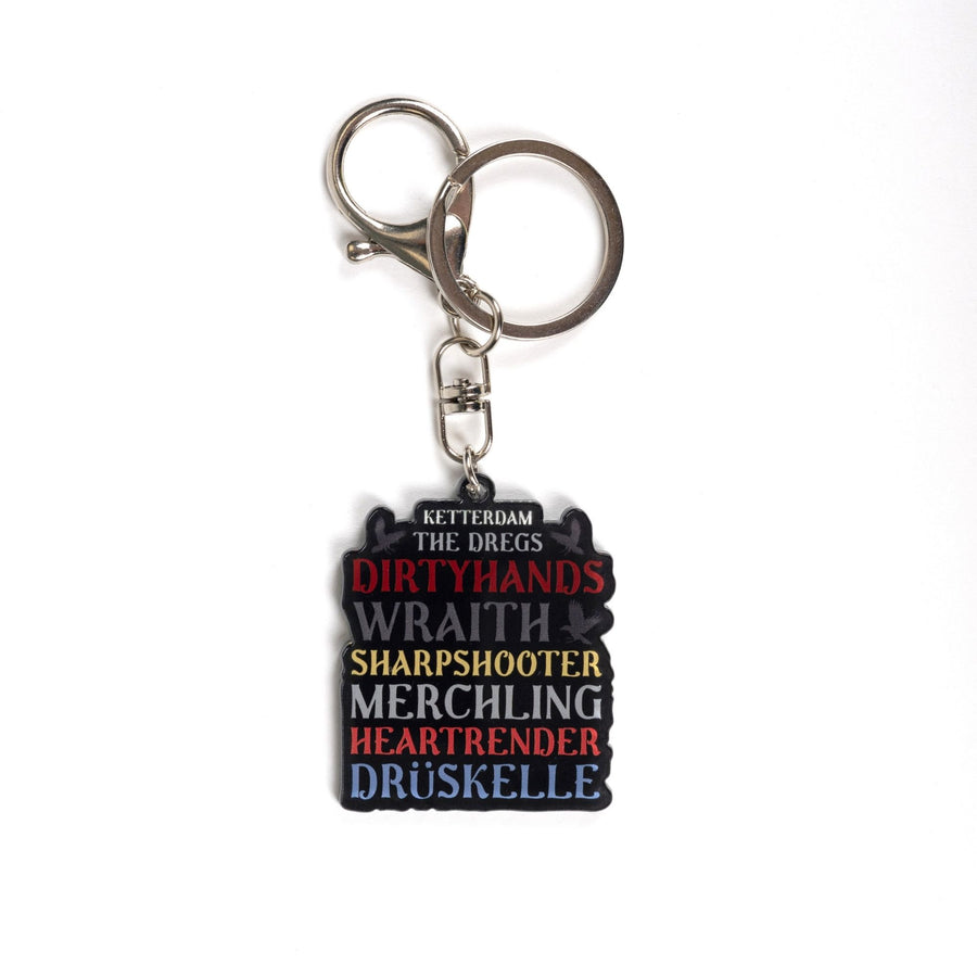  Acrylic keychain that reads ‘Ketterdam, The Dregs, Dirtyhands, Wraith, Sharpshooter, Merchling, Heartrender, Druskelle.’ From Six of Crows.
