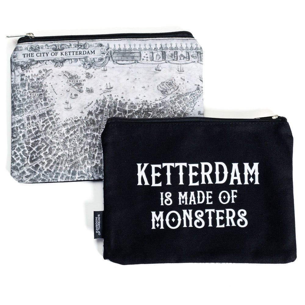  Two sides of a black and white pouch with the map of Ketterdam. Other side is black with the quote ‘Ketterdam is made of monsters’ from Six of Crows by Leigh Bardugo.

