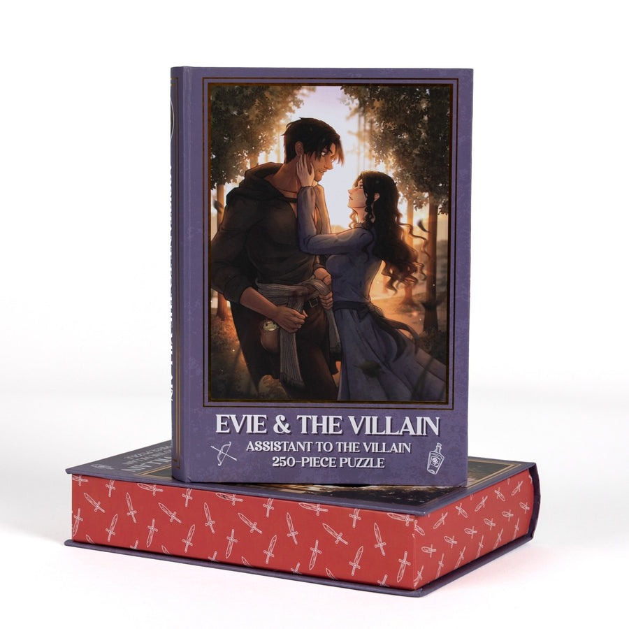  Book-shaped black box for Evie and The Villain Assistant to the Villain 250-piece puzzle. Art on the front is of Evie and the Villain in the forest.