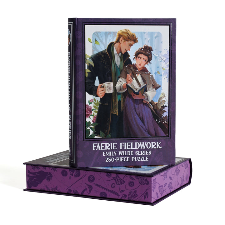 Book-shaped purple box for Faerie Fieldwork Emily Wilde Series 250-piece puzzle. Art on the front is of Emily and Wendell.