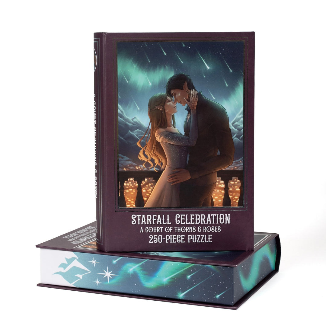 Book-shaped box for Starfall Celebration A Court of Thorns and Roses 250-piece puzzle. Art on the front is of Feyre and Rhys.
