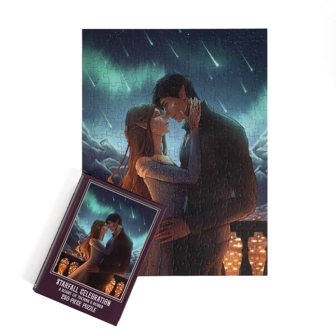 Full completed puzzle of Feyre and Rhys and purple, book-shaped box with matching art for Starfall Celebration A Court of Thorns and Roses 250-piece puzzle.
