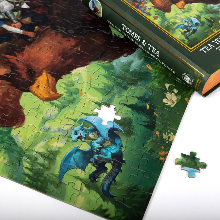Close up of completed puzzle of Kianthe and Reyna flying on a griffin from the Tomes and Tea series with one piece missing.