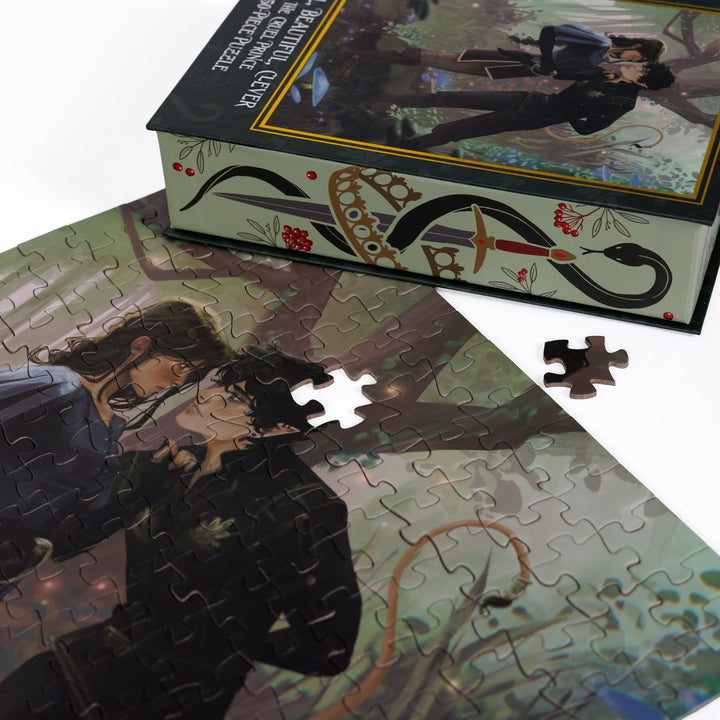 Close up of completed puzzle of Jude and Cardan from The Cruel Prince with one piece missing.