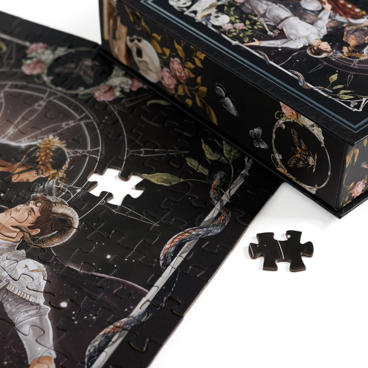 Close up of completed puzzle of Alex Stern and Darlington depicted as a queen and her knight with one piece missing.