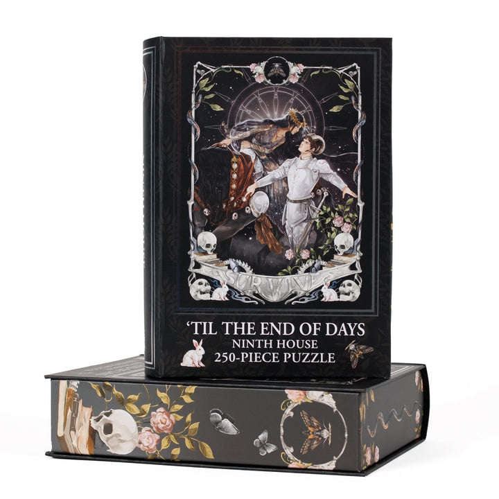Book-shaped black box for ‘Til the End of Days Ninth House 250-piece puzzle.’ Art on the front is of Alex and Darlington depicted as a queen and her knight.