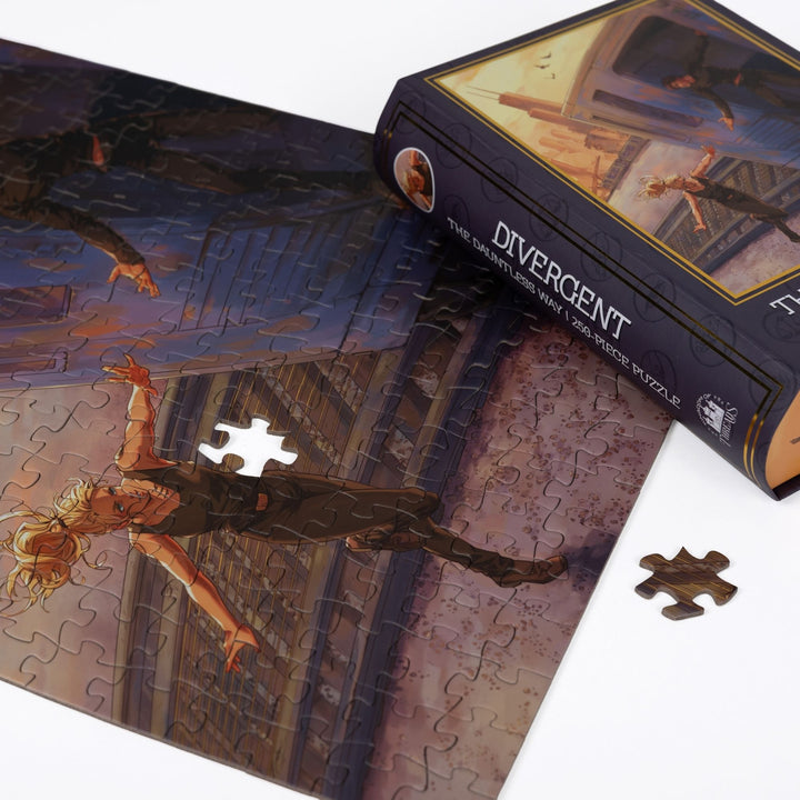 Close up of completed puzzle of Tris and Four from Divergent with one piece missing.