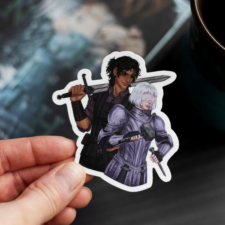 Sticker of Sybil in armor, brandishing a hammer, with Rory, sword over his shoulder  held over Knight & the Moth.