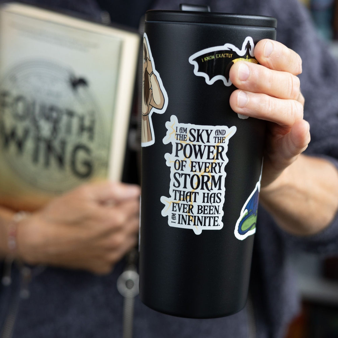 Quote sticker: ‘I am the sky and the power of every storm that has ever been. I am infinite.’ Black text over lightning strikes on a black tumbler.

