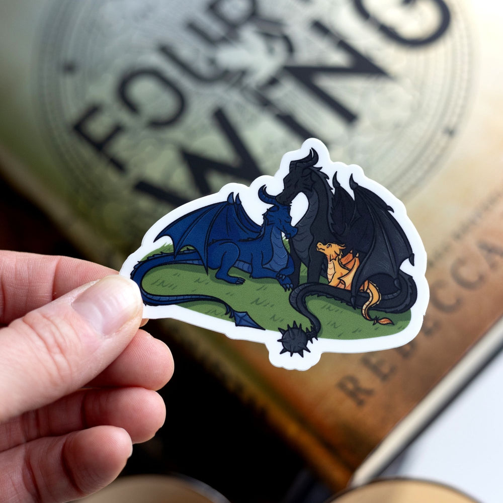 Sticker of 3 dragons - a blue and a black adult with a golden baby dragon - cuddled up like a family, held over Fourth Wing.
