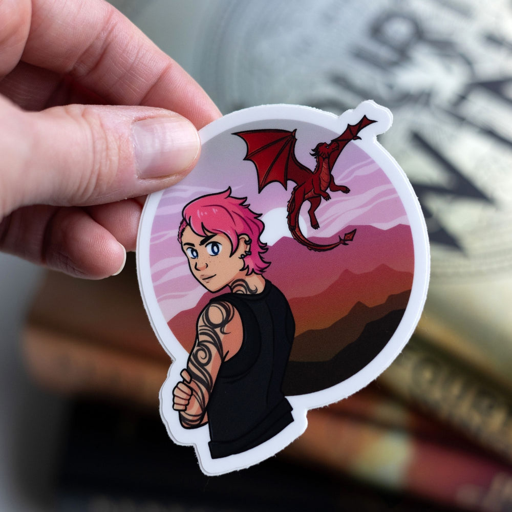  Sticker of Imogen, with pink hair, and her red dragon Glane flying behind her. Held over Fourth Wing