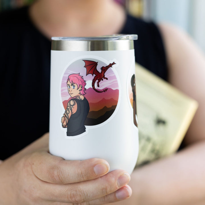 ticker of Imogen, with pink hair, and her red dragon Glane flying behind her. Characters from Fourth Wing. On a white tumbler.

