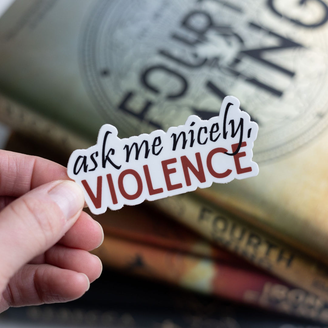  Fourth Wing quote sticker: ‘Ask me nicely, Violence’ in red and black letters Held over Fourth Wing