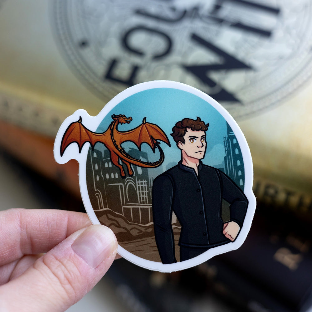 Sticker of Brennan in a black shirt with a castle behind him and a golden dragon flying in the background. Held over Fourth Wing
