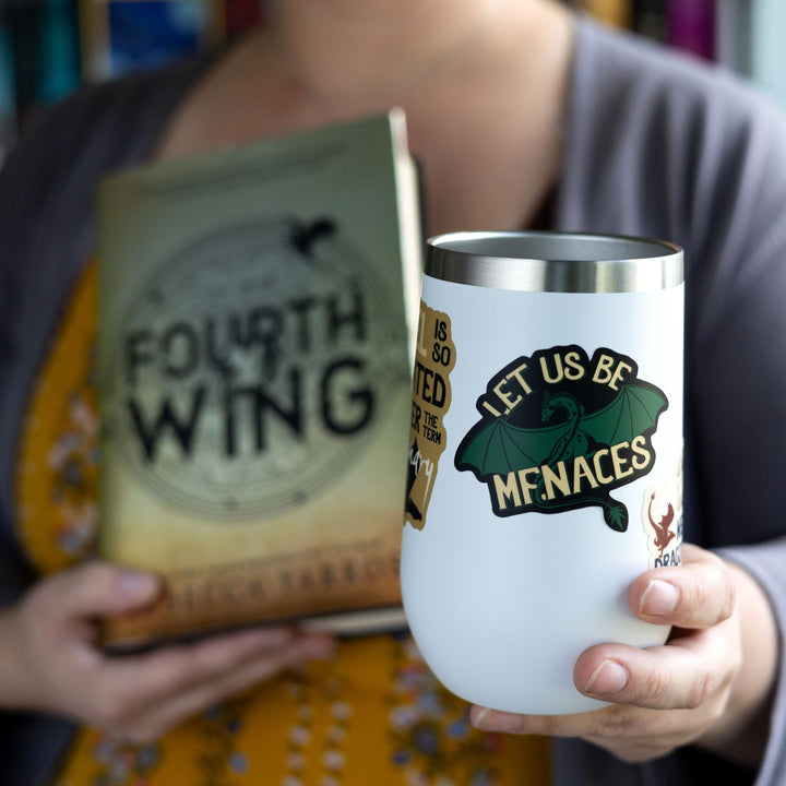 Feirge, a green dragon from Fourth Wing, with text that reads ‘Let us be menaces.’ On a white tumbler.
