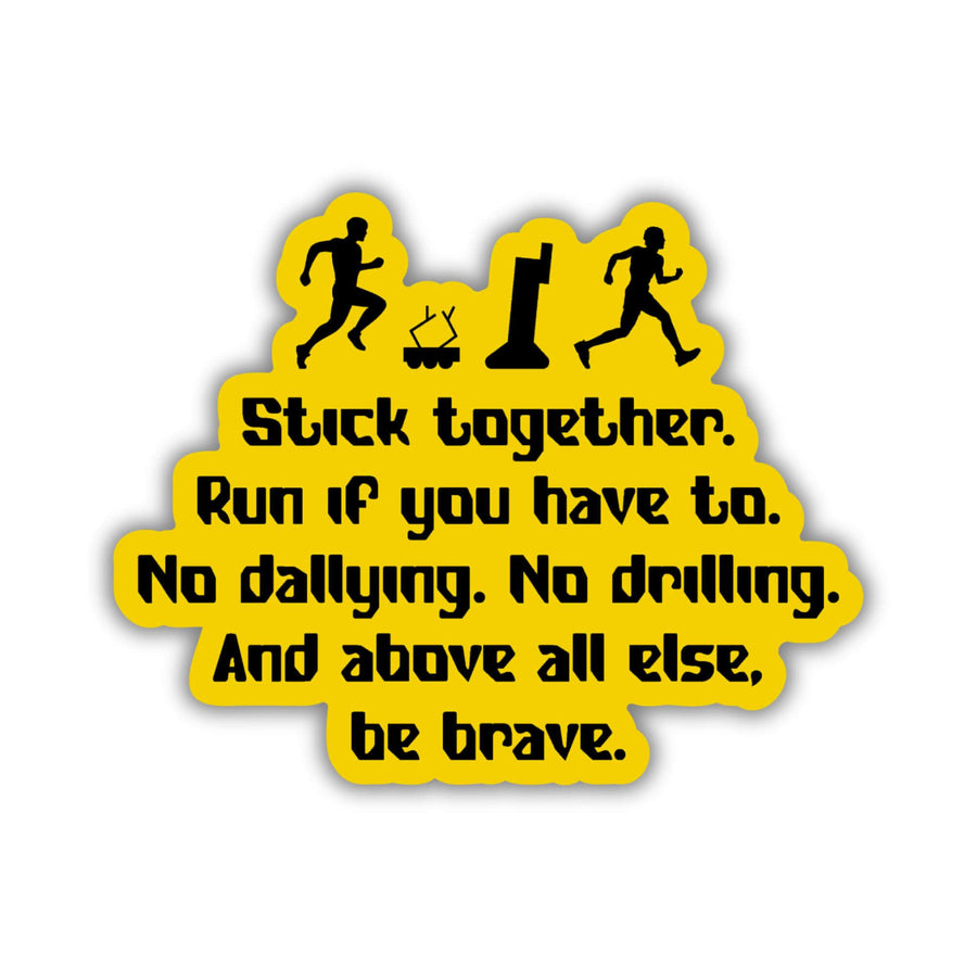 Yellow sticker with an In the Lives of Puppets quote: Stick together. Run if you have to. No dallying. No drilling. And above all else, be brave.