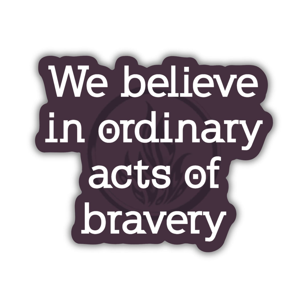 Divergent quote sticker in white text on a dark purple background. ‘We believe in ordinary acts of bravery.’ 