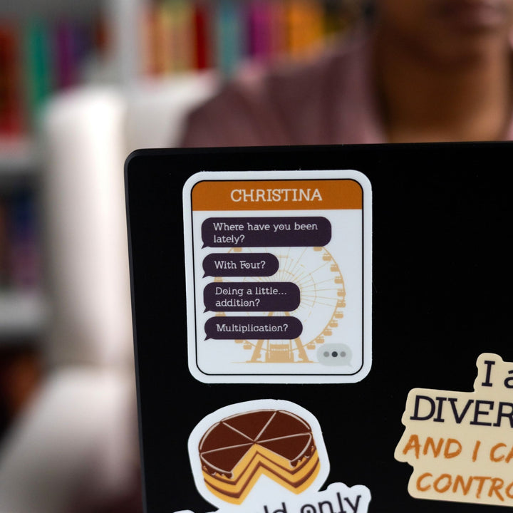 Sticker of a text chain with purple text bubbles with ‘Where have you been lately? With Four? Doing a little…addition? Multiplication?’ and CHRISTINA in an orange header on a laptop.
