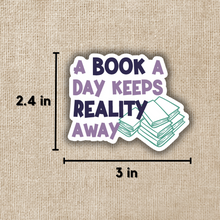 Load image into Gallery viewer, A Book a Day Keeps Reality Away Sticker
